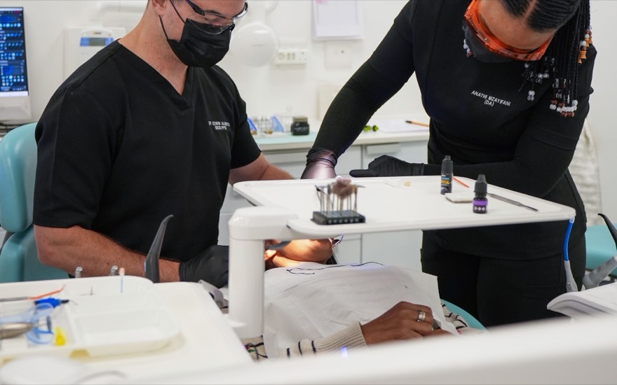The Melrose Dental Studio team performing a professional scale and polish for a patient